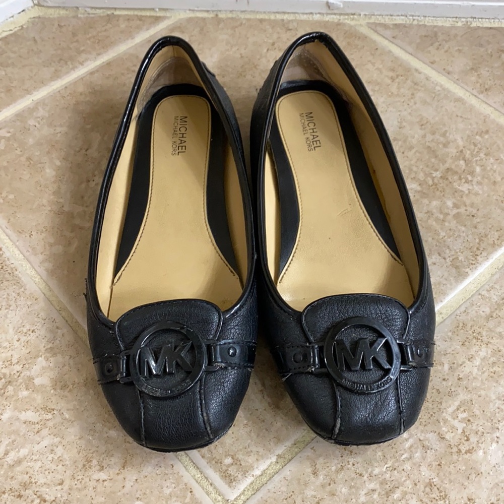 MK black flats